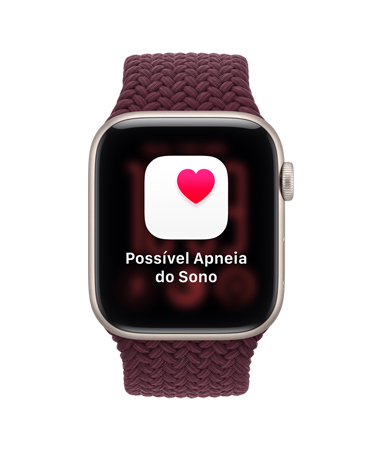 Apple Watch SE 3 com caixa estelar de alumínio e pulseira loop esportiva trançada na cor bordô. A tela mostra o monitoramento de saúde (notificação de possível apneia do sono). Digital Crown no lado direito.