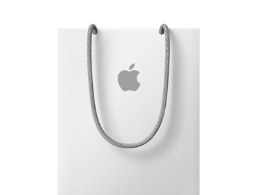 Shopping bag bianca di Apple Store, con logo Apple grigio e manici grigi