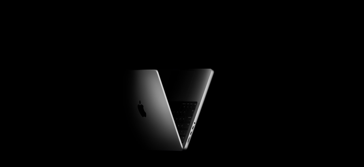 MacBook Pro posicionado en forma de V, en alusión a la familia de chips M5