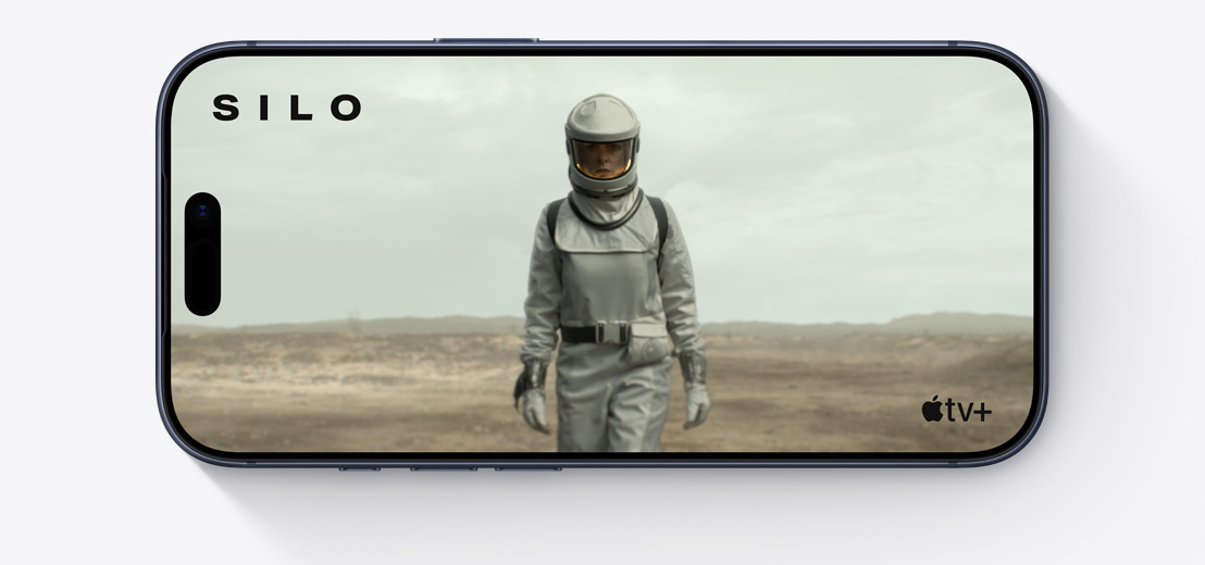 „iPhone“ priekinės pusės išorė, horizontalus, „Apple TV“ klipas, kuriame rodomas skafandrą dėvintis žmogus, „Silo“