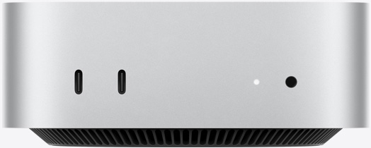 Hõbedase Mac mini eestvaade, kus on näha esiküljel asuvad kaks USB‑C liidest ja 3,5 mm kõrvaklapipesa.