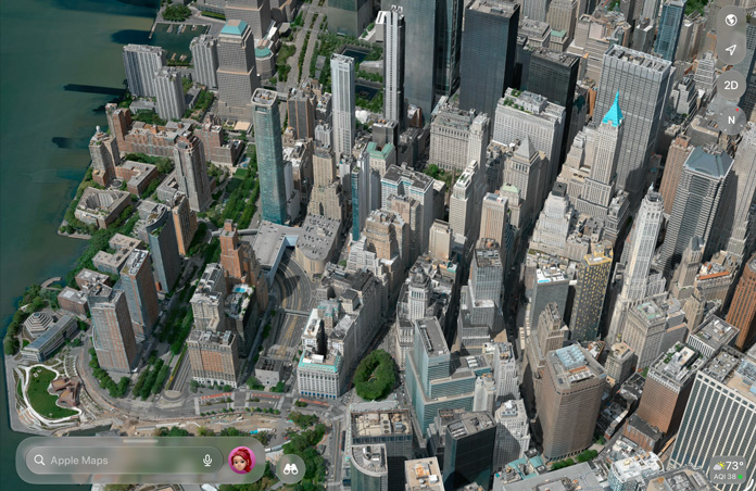 Mappe di Apple che mostra una vista aerea dettagliata di una città, con edifici, strade e spazi verdi