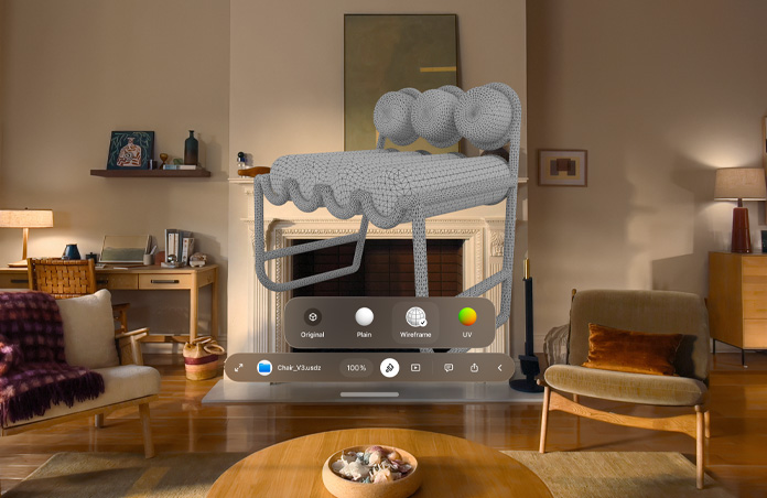 Vue d’un Apple Vision Pro montrant une fenêtre de notification Coup d’œil pour un fichier USDZ représentant une chaise, avec une maquette de chaise visible derrière la fenêtre